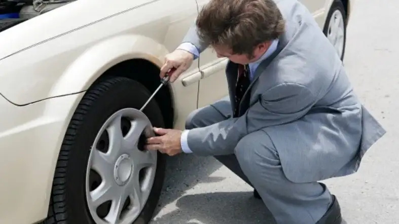 Park The Vehicle And Remove Hubcap