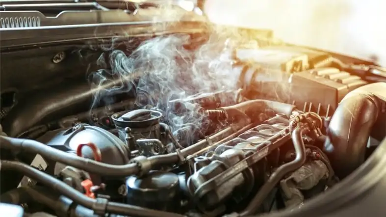 What should I do if the engine starts to overheat while driving